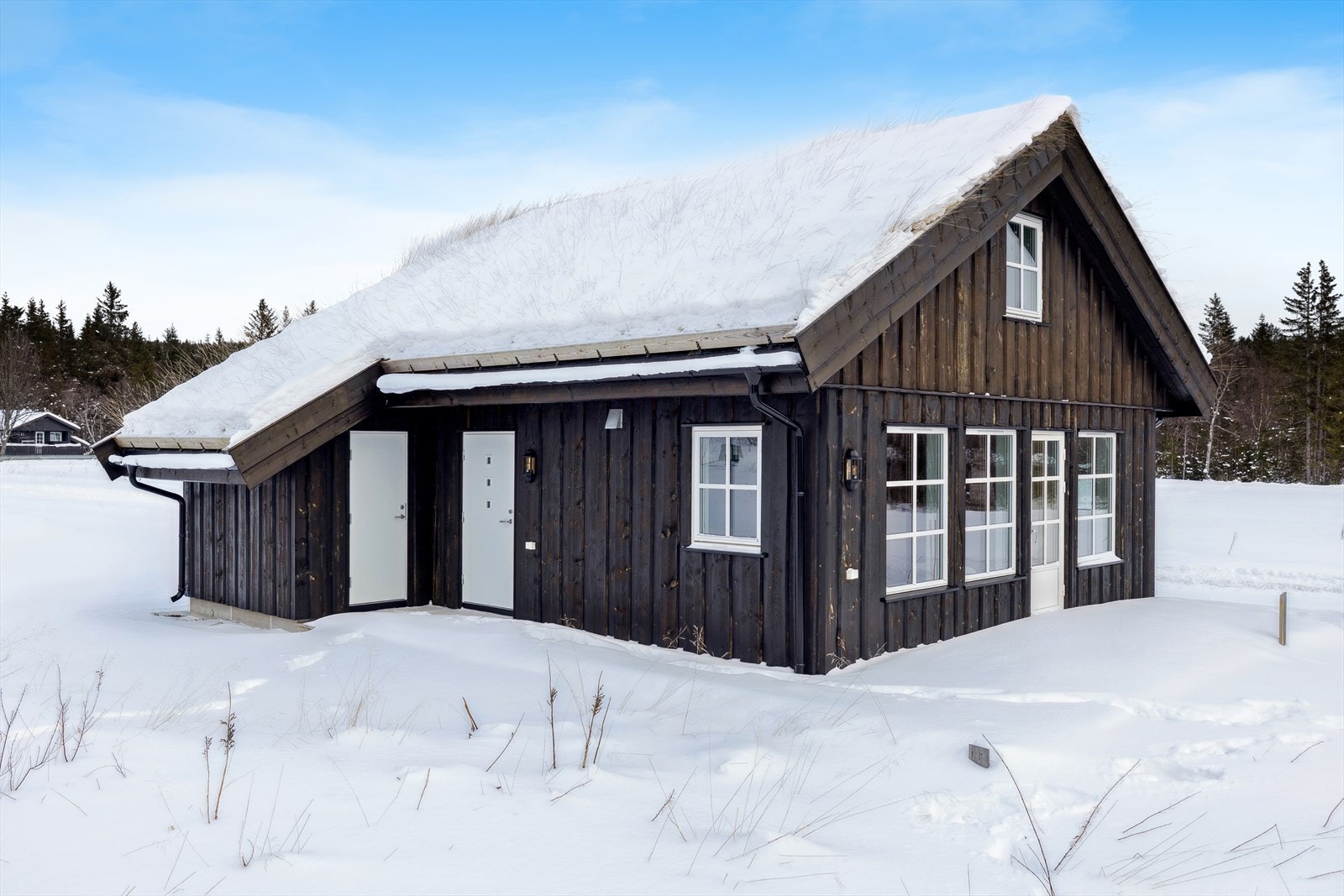 Sikre deg en utstillingshytte med rabatt! Moderne hytter i naturskjønne omgivelser - Raulandsfjell for toppturer, turstier, Totak for strand og fiske. Galleribilde