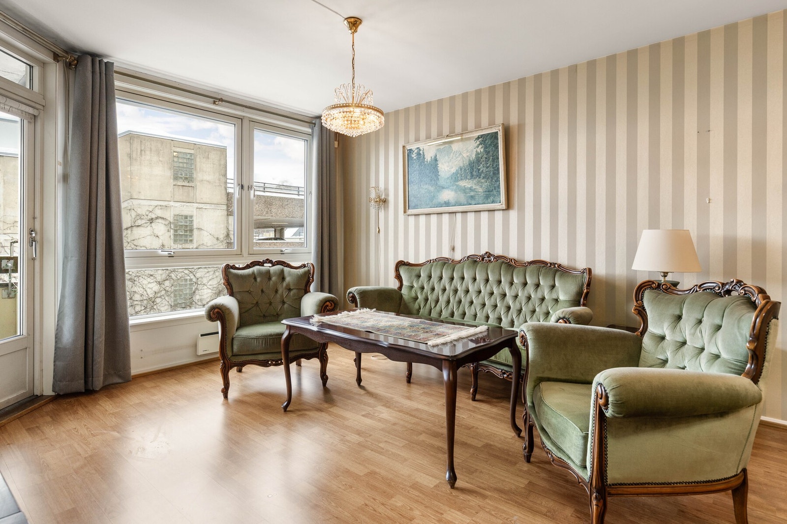 Fra entreen kommer man inn i en hyggelig stue. Galleribilde