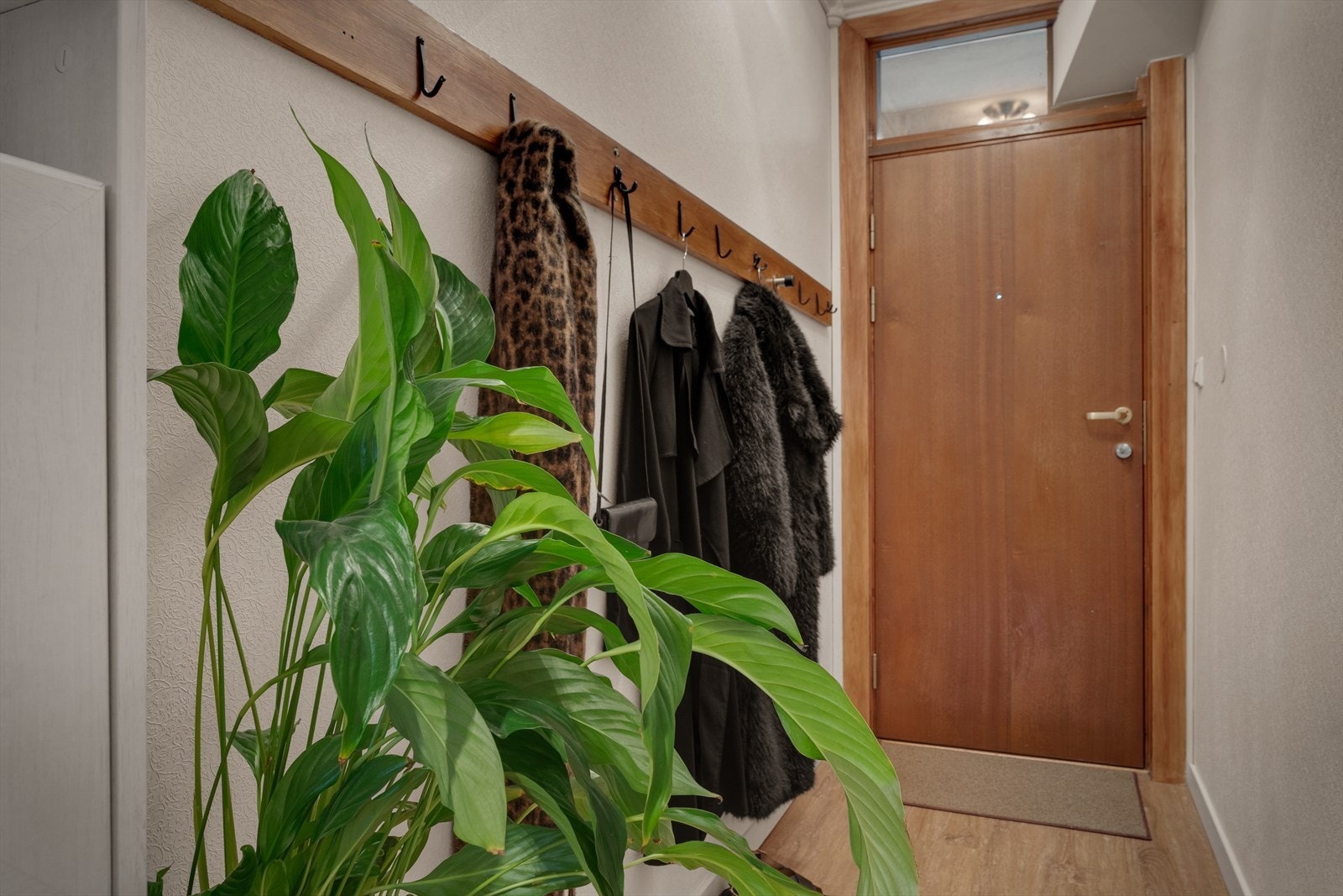 Du blir ønsket velkommen inn i en romslig entre på 3,7m² Galleribilde