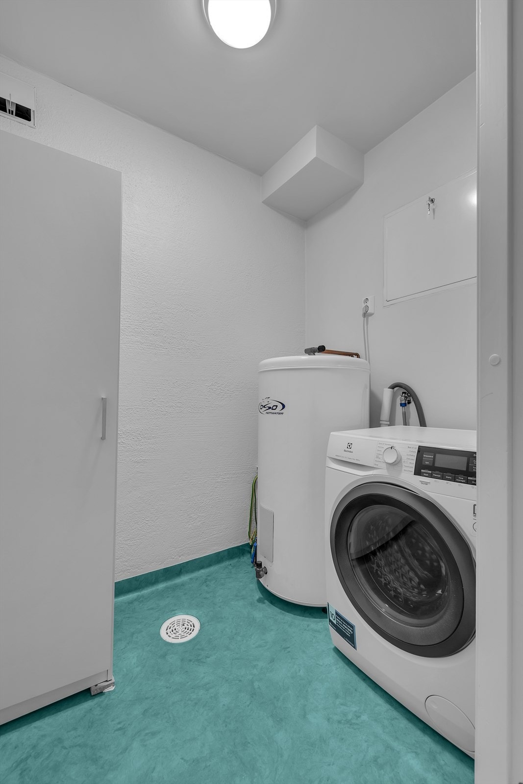 Leiligheten har også eget vaskerom - praktisk i en travel hverdag. Galleribilde