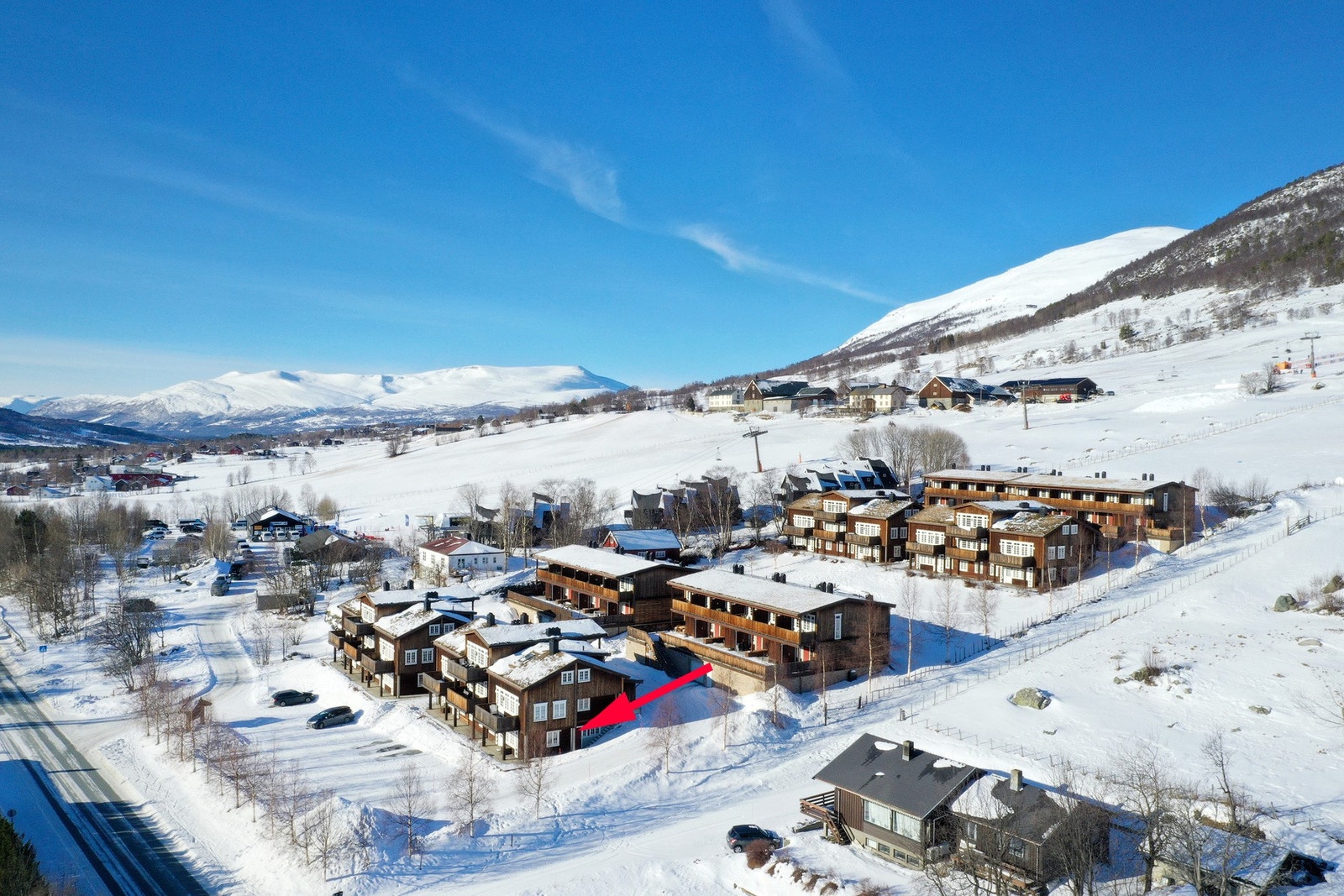 Disponerer p-plass på felles biloppstillingsplass. Galleribilde