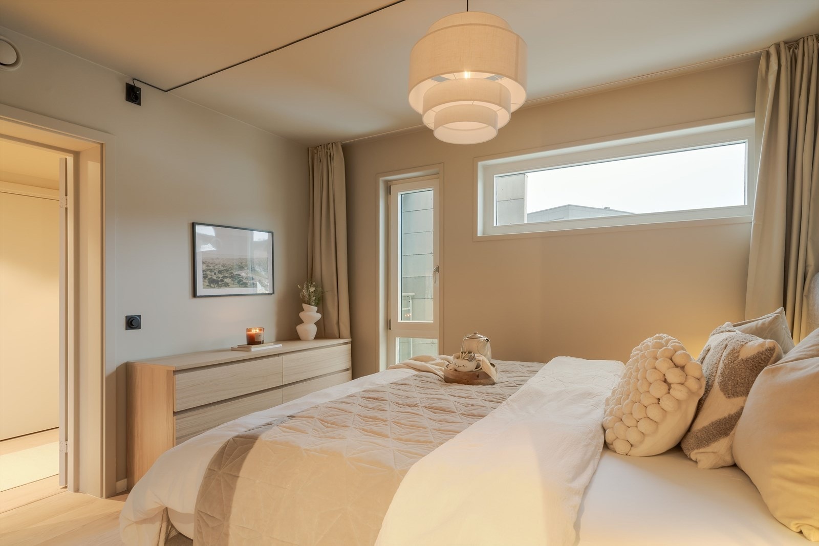 Soverommene er holdt i duse farger for en behagelig atmosfære. Galleribilde