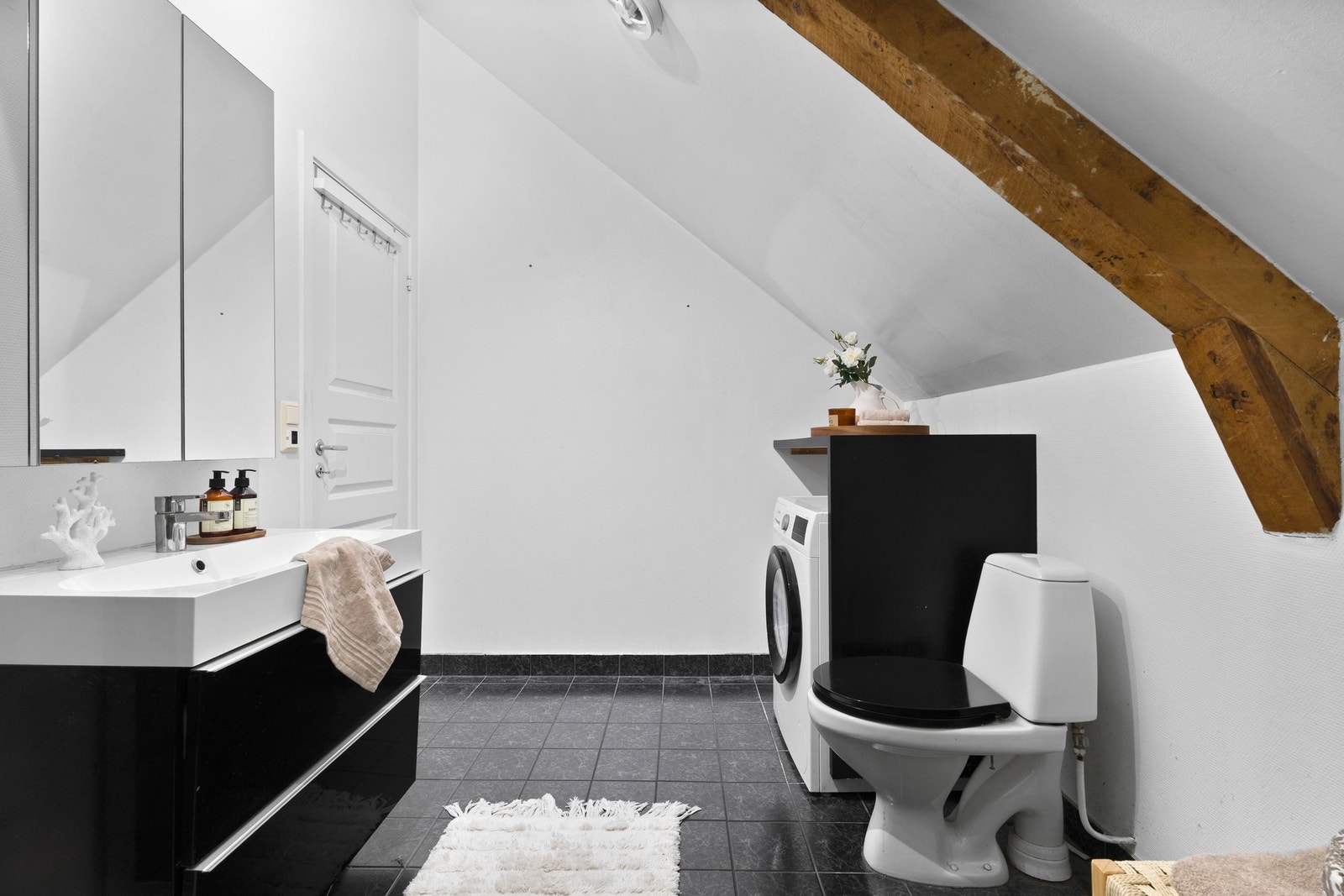 Badet har opplegg til vaskemaskin. Galleribilde