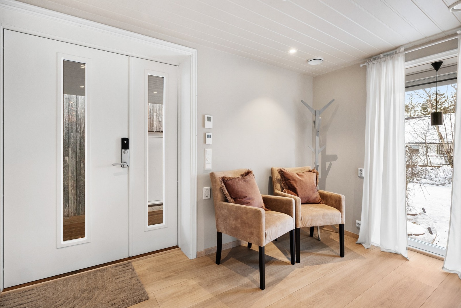 Entré som kombinerer stil og innbydende atmosfære Galleribilde