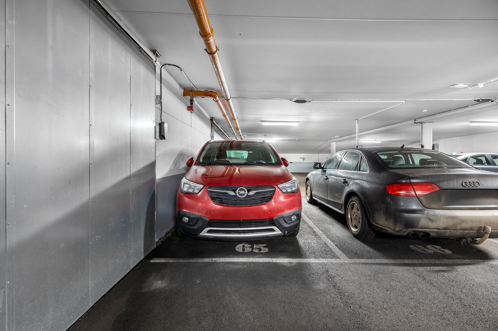 Garasjeplass nr.65 i felles, oppvarmet garasjekjeller. Galleribilde