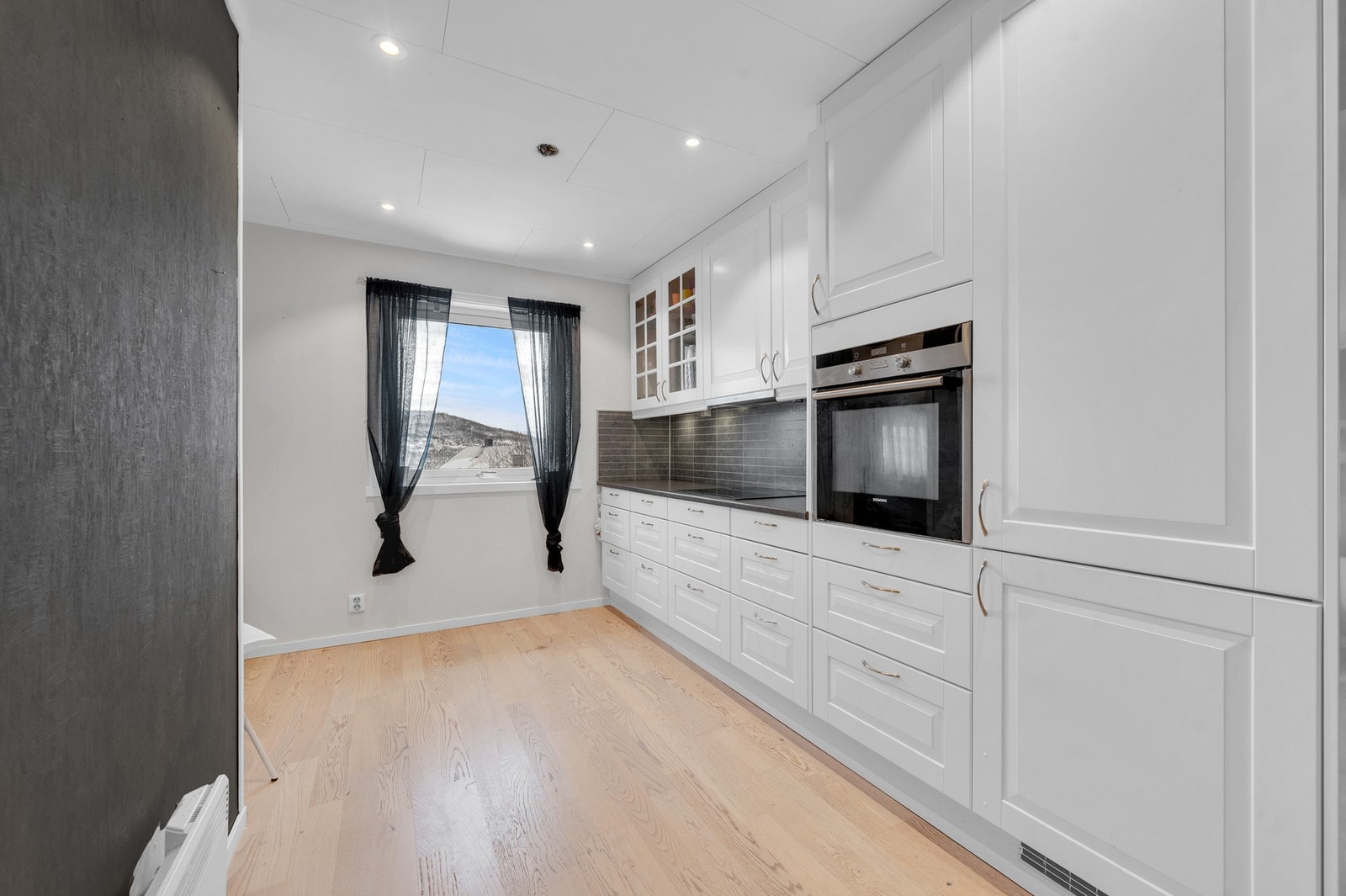 - Her kan dere enkelt samarbeide på kjøkkenet uten at det blir trangt om plassen. Galleribilde