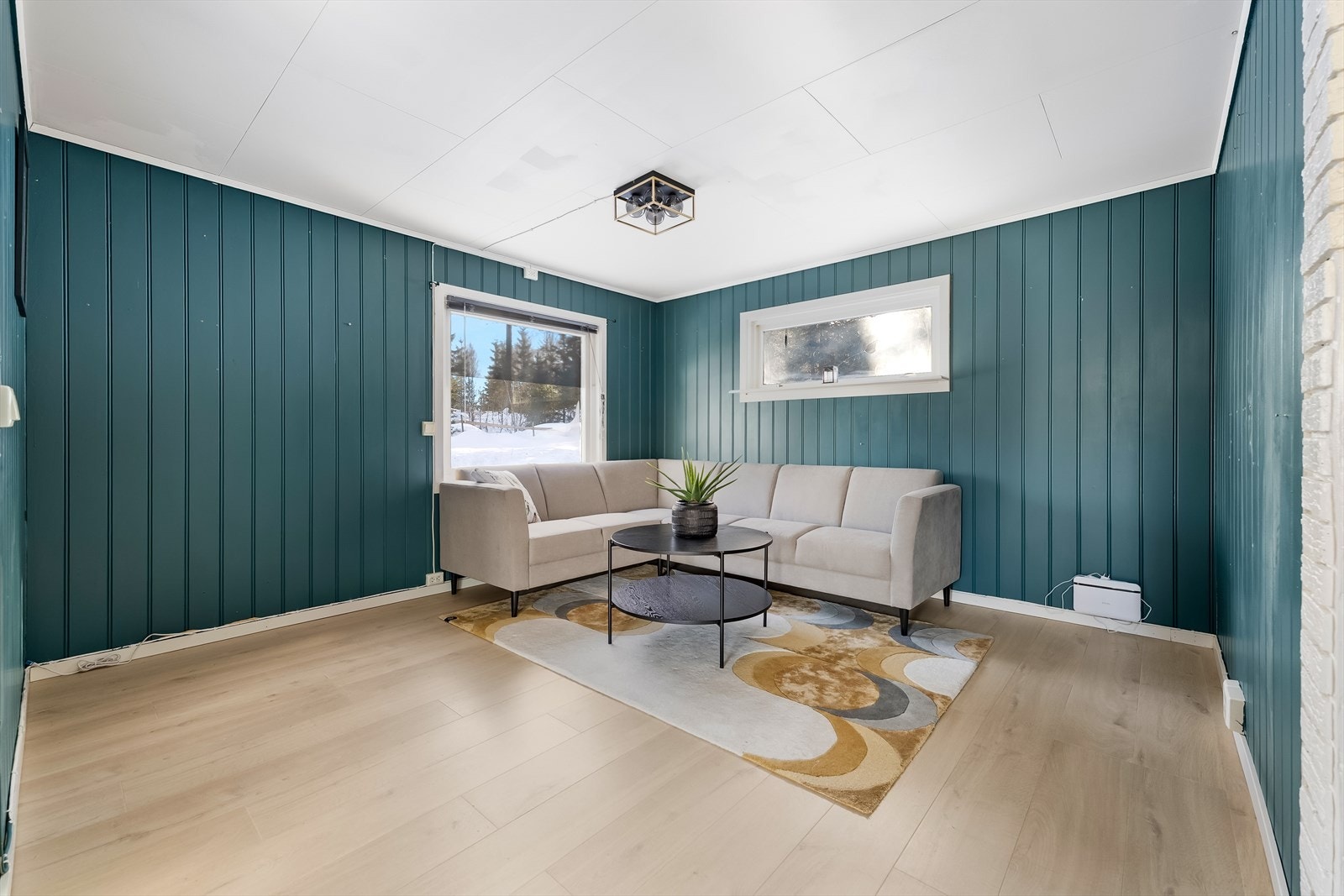 Sofaområdet er oppbygd et nivå for å skape egen sone. Galleribilde