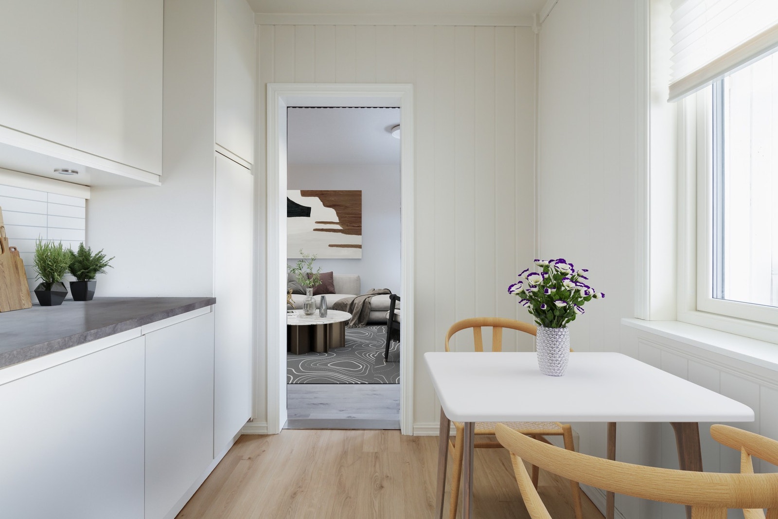 Pent og godt kjøkken med nok av både skaper og benkeplass Galleribilde