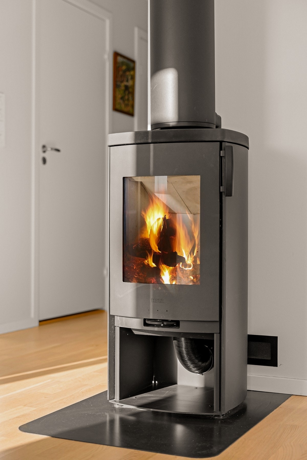 Peisovn som gir behagelig varme på kaldere dager Galleribilde