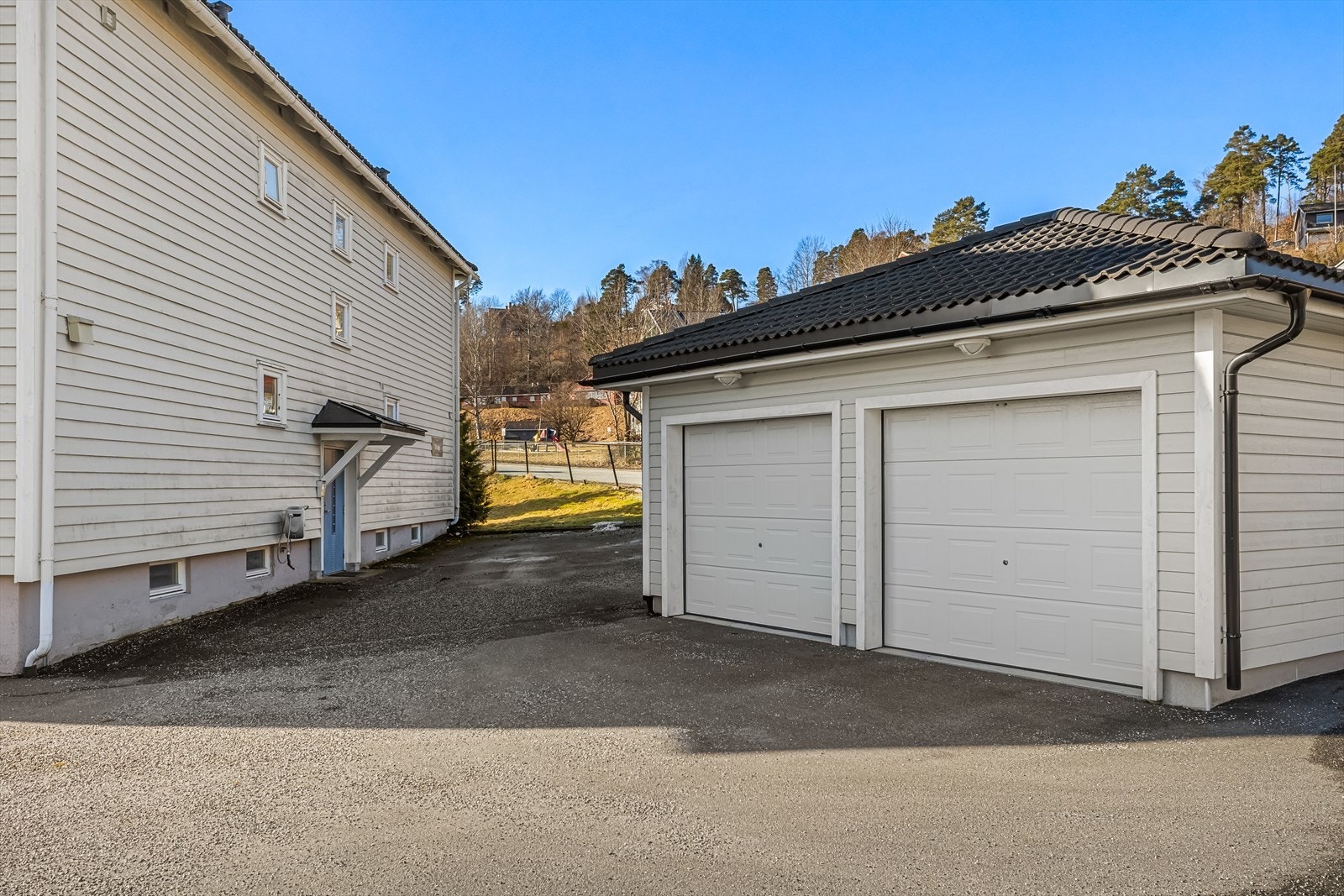 Det medfølger en parkeringsplass i garasje Galleribilde