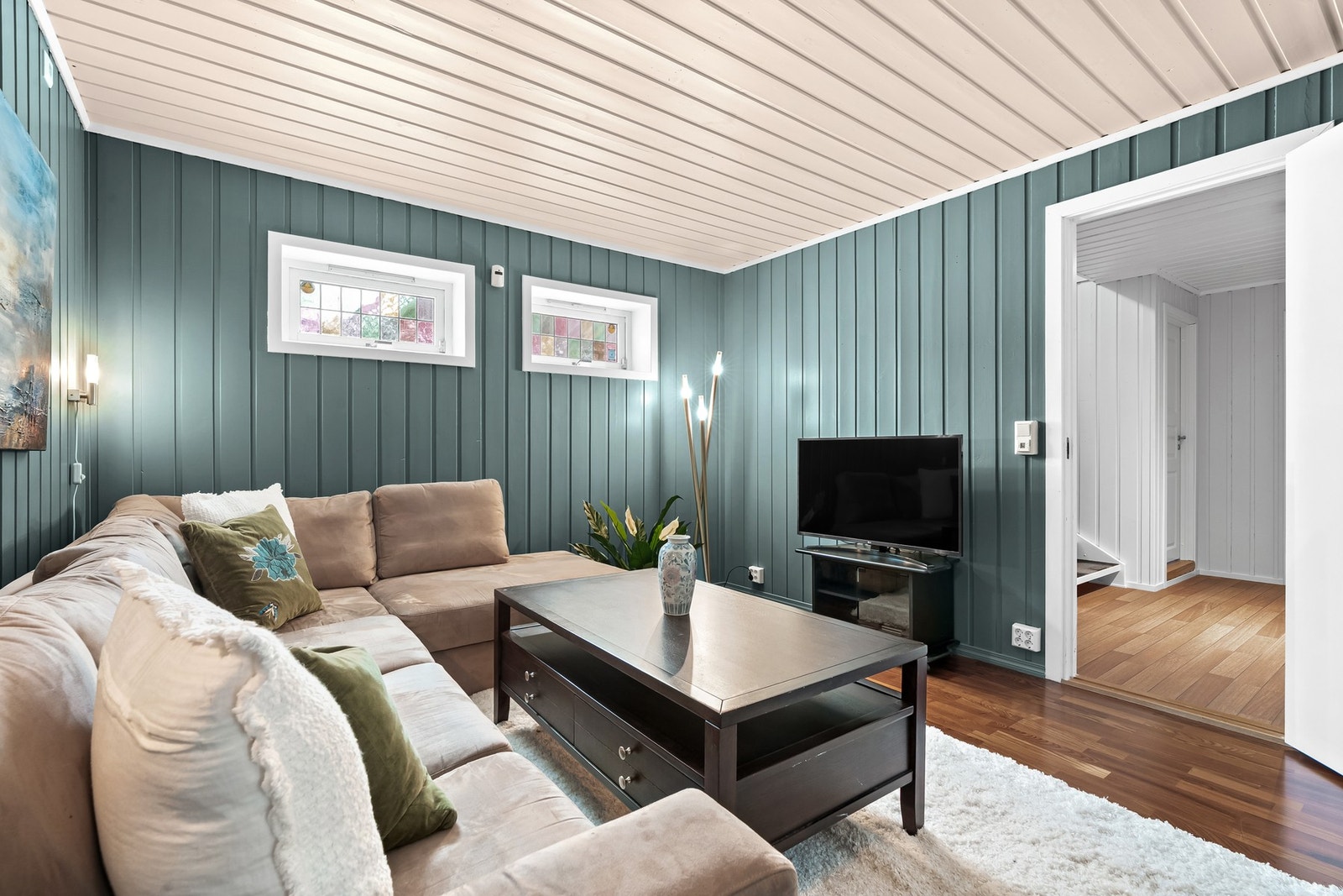 Rommet innbyr til avslapning og sosiale sammenkomster. Galleribilde