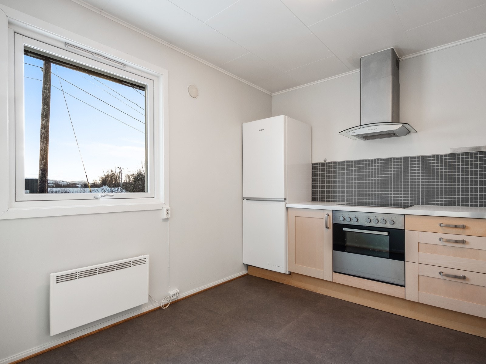 Det e r plass til lite spisemøblement på kjøkkenet Galleribilde