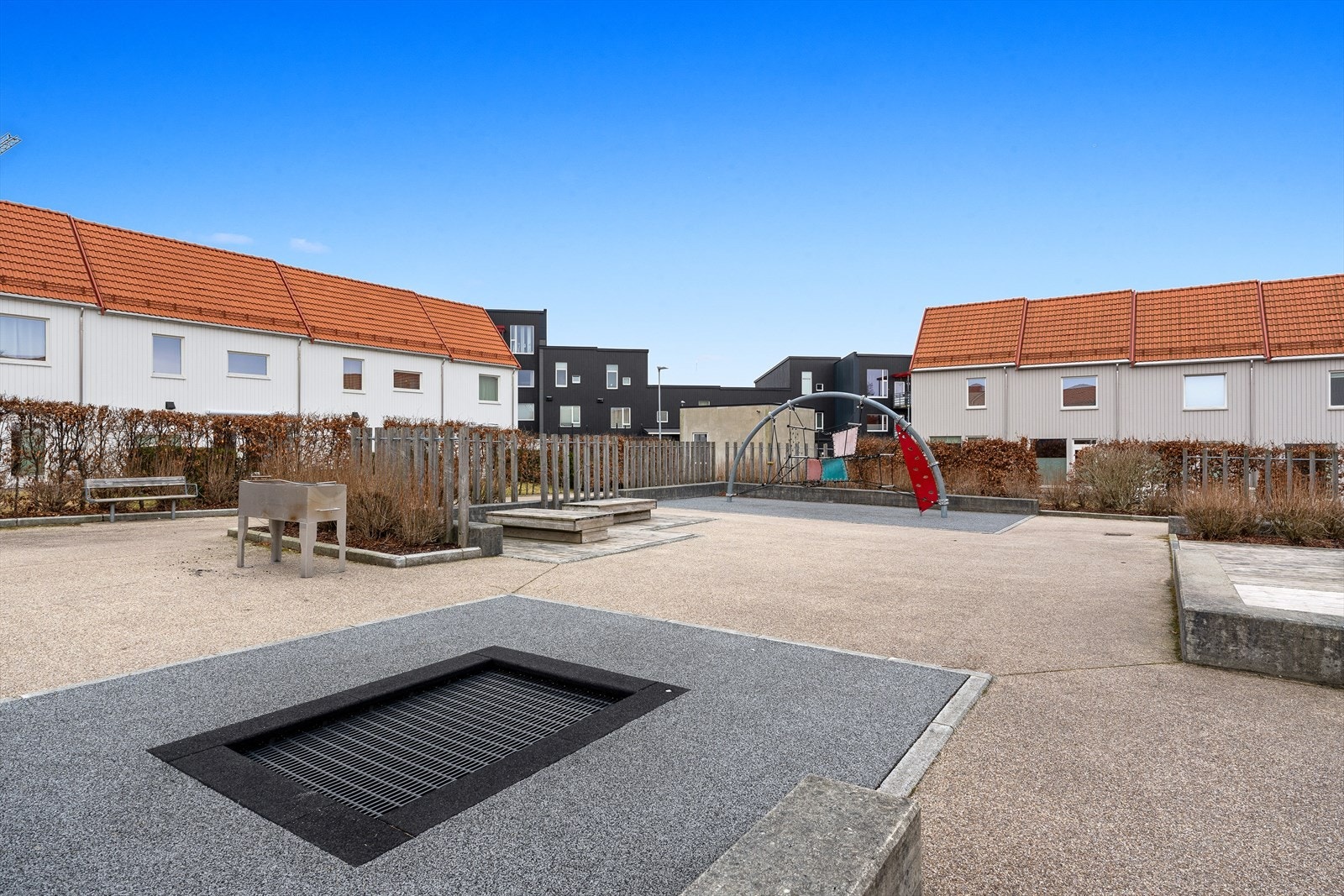 Fellesarealer som er pent opparbeidet. Galleribilde