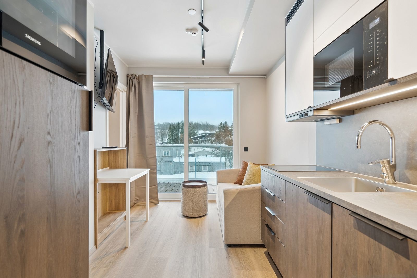 Studioleilighet 1 med åpen løsning stue/kjøkken - utgang til balkong fra stue! Galleribilde