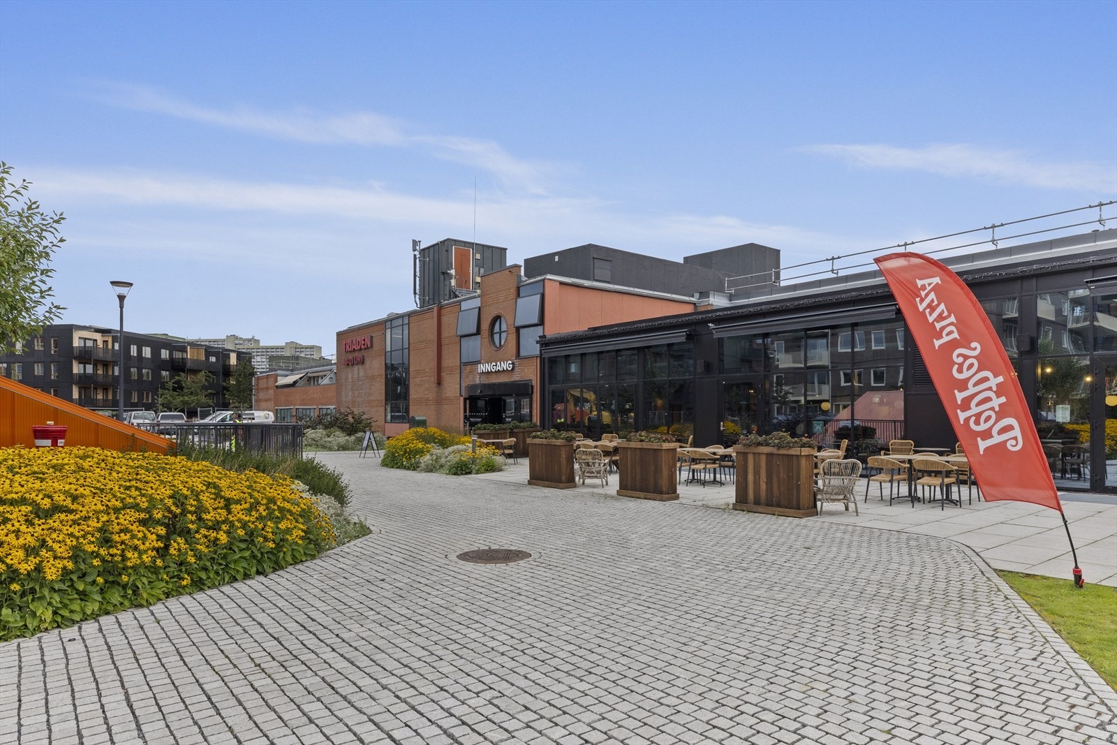 Triaden kjøpesenter stod ferdig i 2024 og kan skilte med et bredt tilbud av butikker, restauranter og andre servicefasiliteter Galleribilde