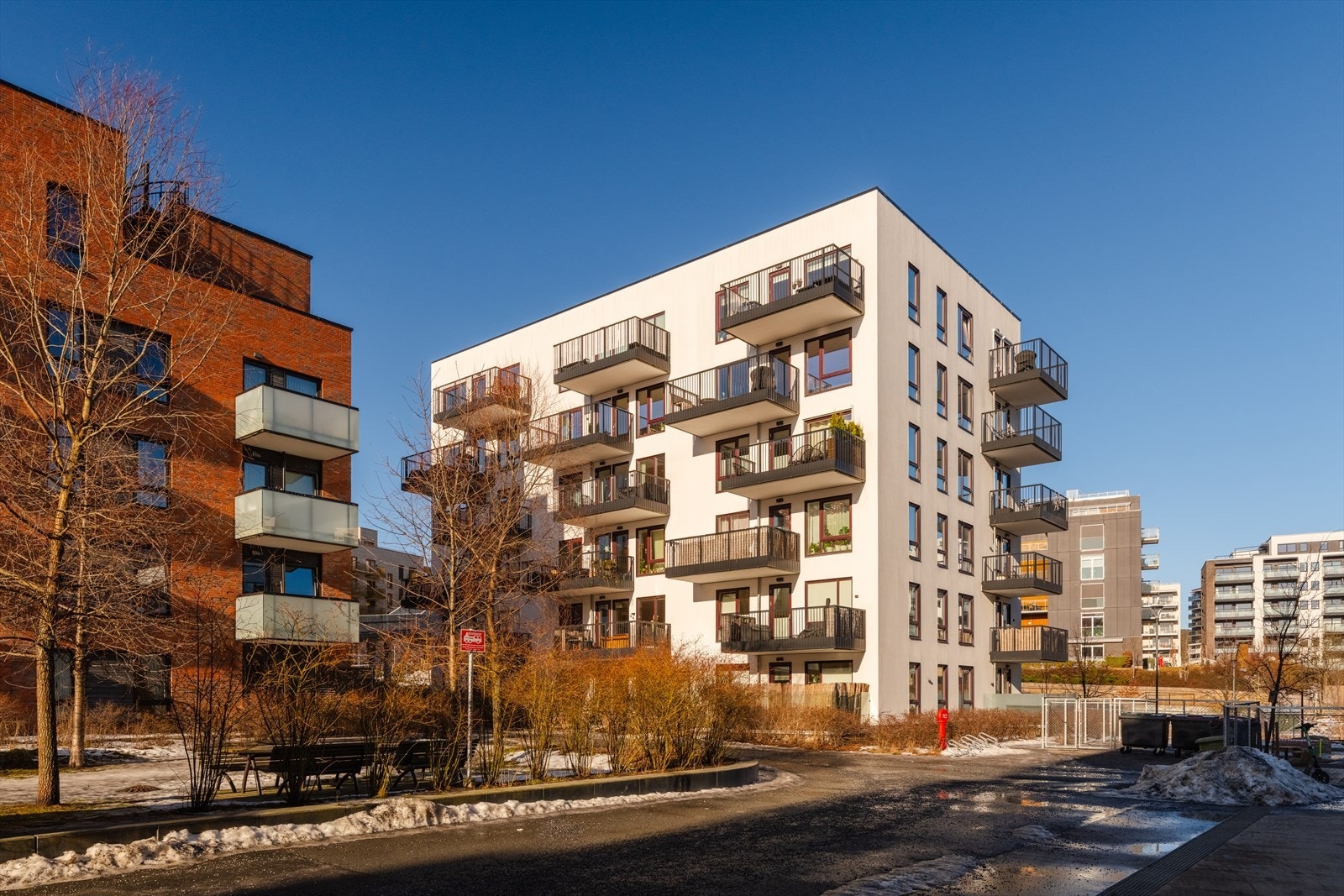 Bomiljøet er moderne, sosialt og godt tilrettelagt - perfekt for deg som ønsker å bo sentralt, men likevel skjermet og rolig Galleribilde