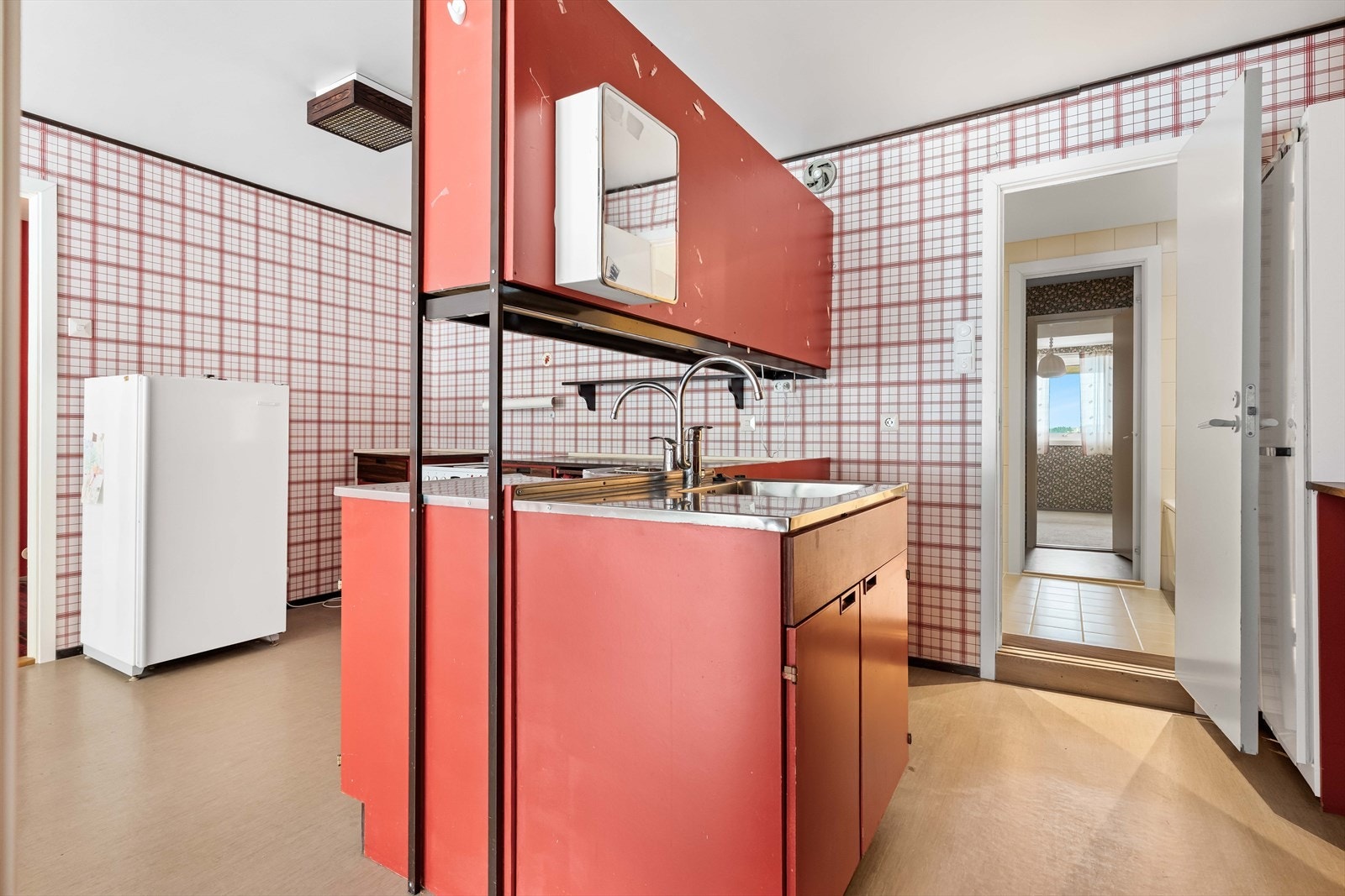 Kjøkkenet har behov for modernisering. Galleribilde