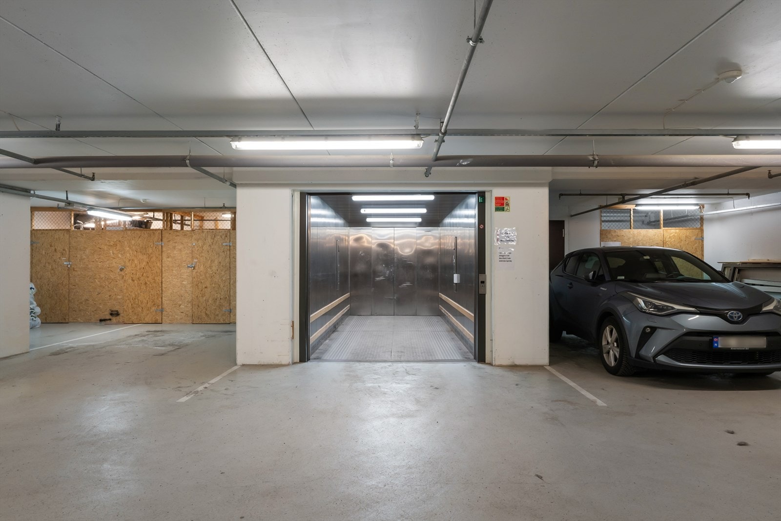 Felles parkeringsanlegg med bilheis Galleribilde