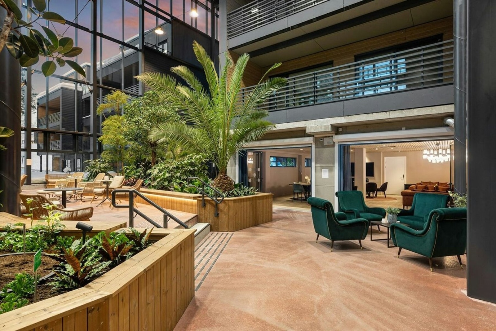 Signaturhagens særpreg er den helårige tropiske vinterhagen - et unikt fellesområde som kan brukes året rundt. Galleribilde