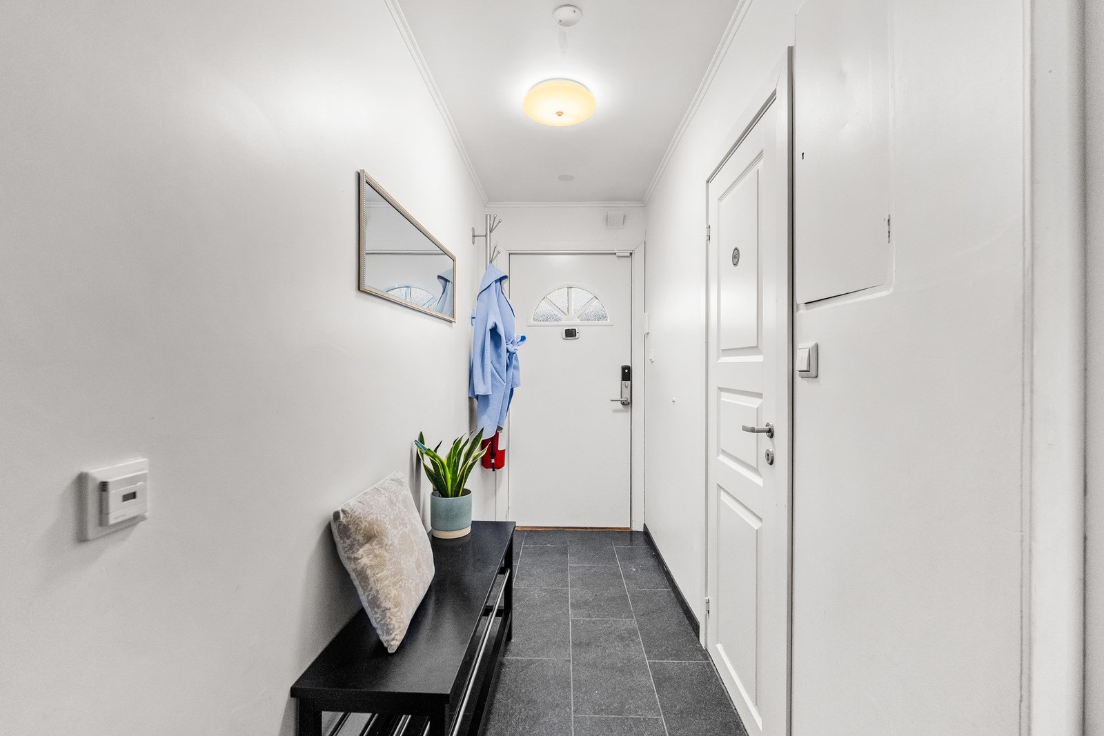 Det er montert kodelås på ytterdøren. Galleribilde