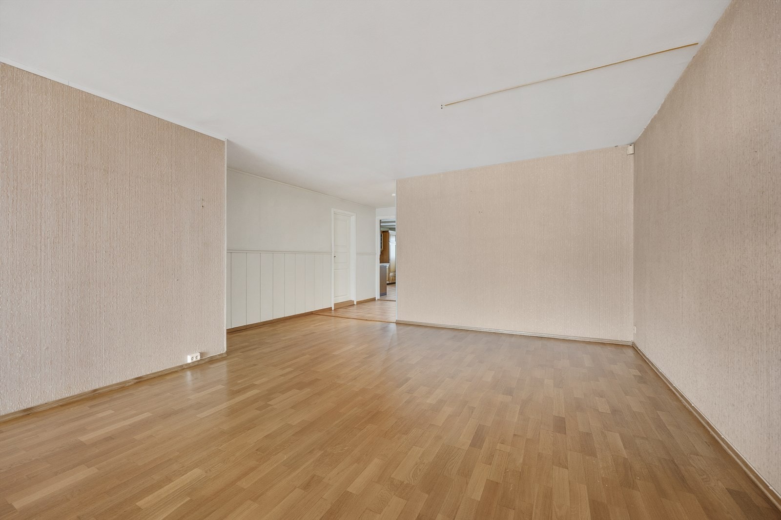 Stuen er et sentralt samlingspunkt i boligen. Galleribilde