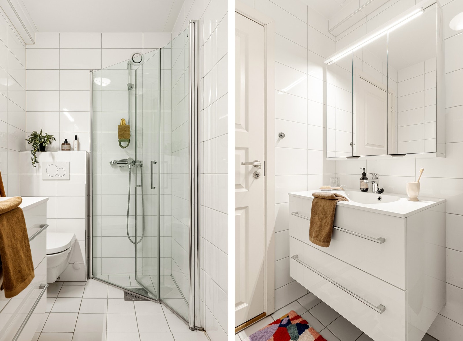 Det er innredet med dusj med glassvegger, vegghengt toalett og baderomsinnredning. Galleribilde