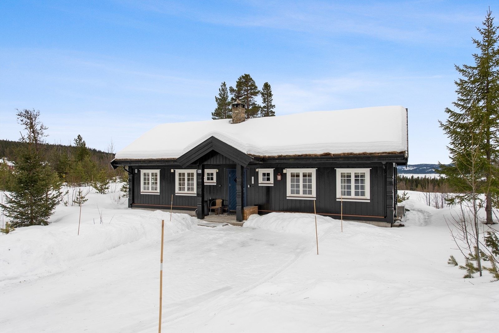 Her kan du nyte en moderne hyttestandard med ski-in/ski-out til langrennsløypene rett utenfor døren. Galleribilde