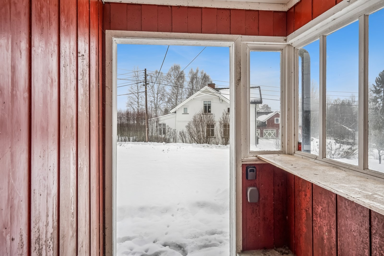 Overbygget og delvis innglasset inngangsparti Galleribilde