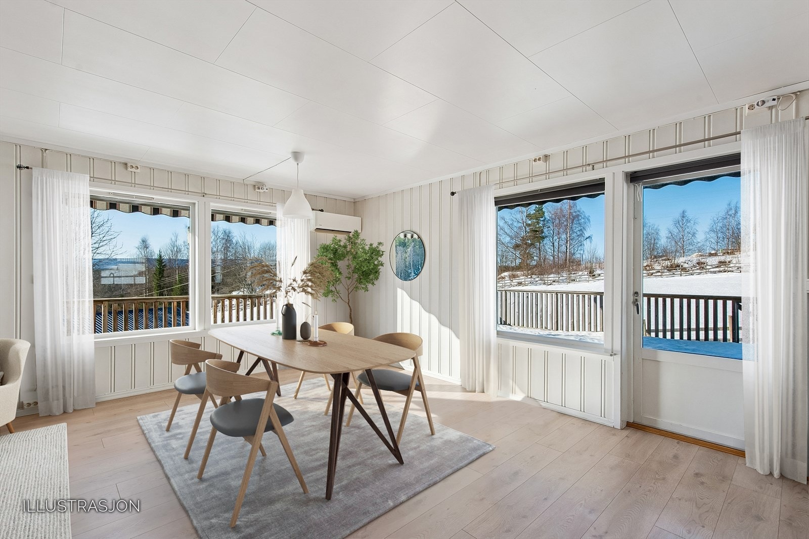 Fra overgangen mellom stue og kjøkken er det direkte utgang til den store, sydvest-vendte terrassen på hele 52 m². Bildet er digitalt møblert. Galleribilde