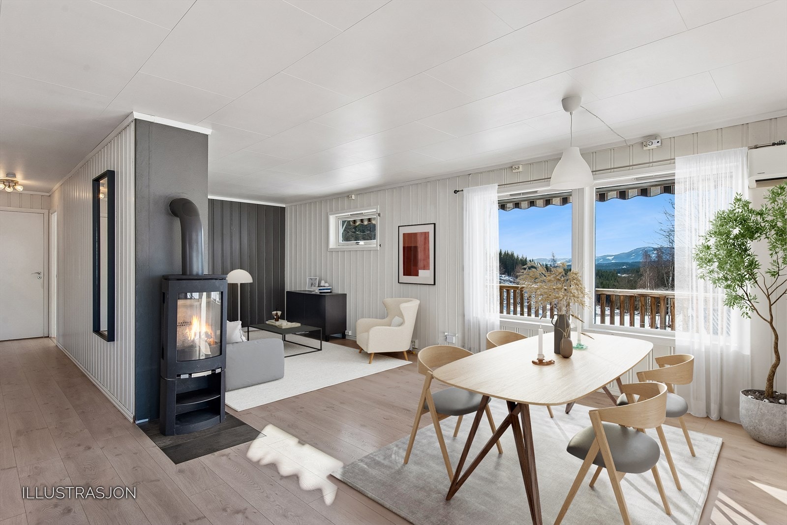 Den åpne løsningen mellom stue og kjøkken skaper en lys og luftig atmosfære. Bildet er digitalt møblert. Galleribilde