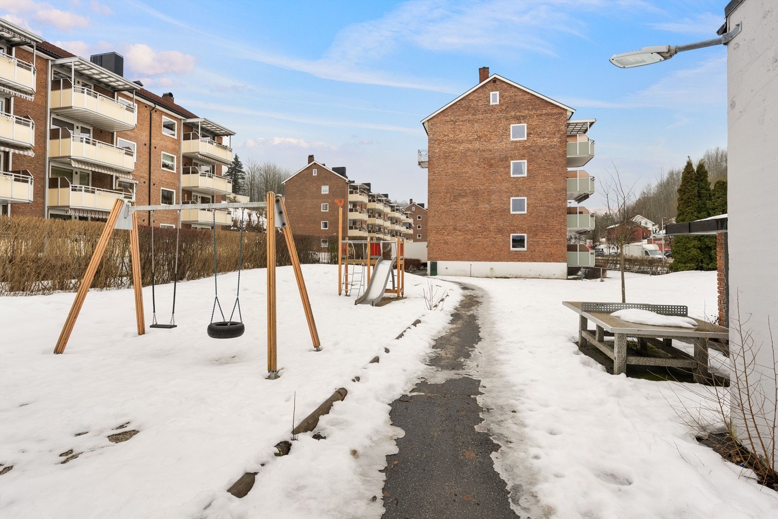 Barnevennlige fellesarealer som innbyr til lek. Galleribilde