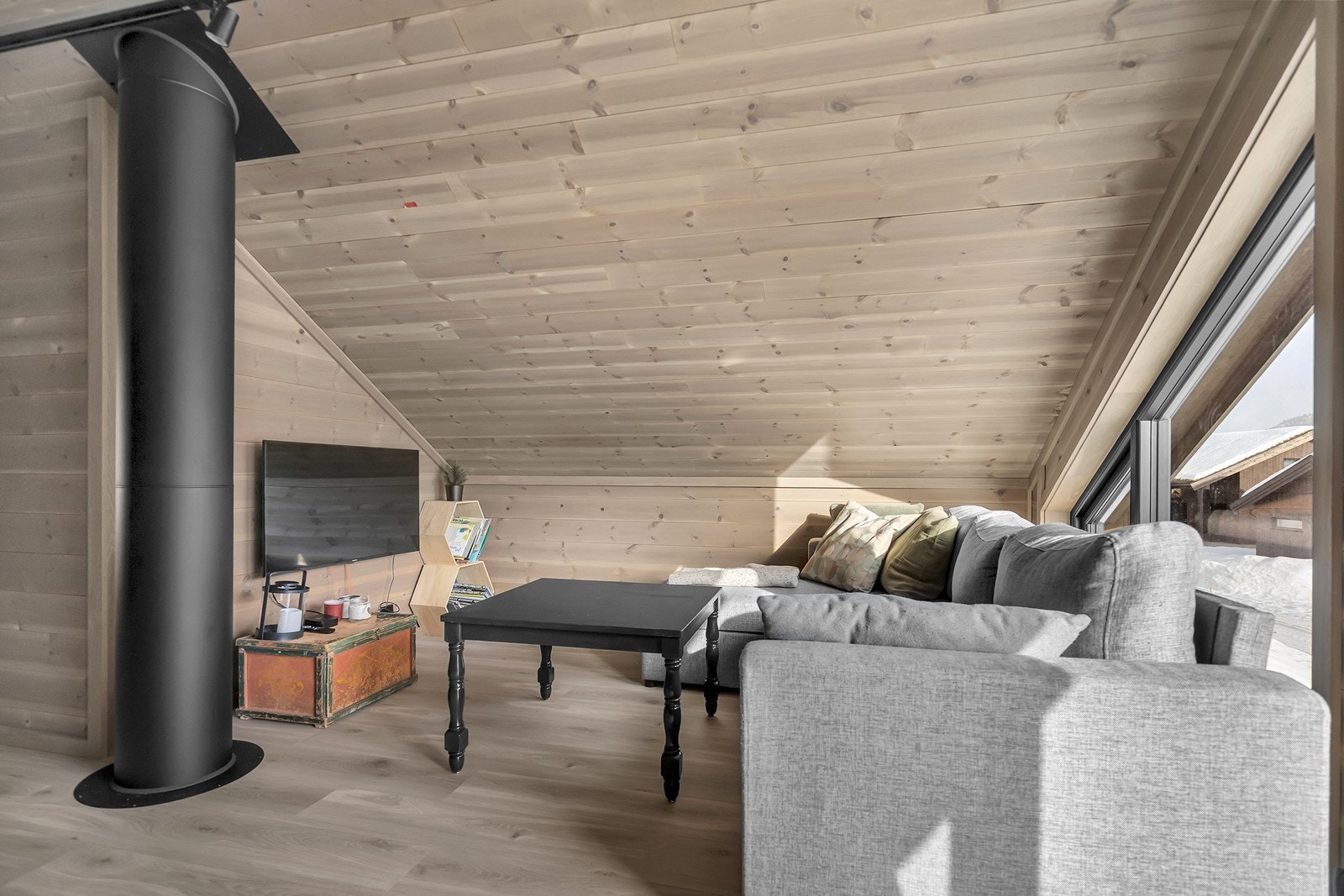 Her vil pipen gi god oppvarming når man fyrer i vedovnen - ikke godkjent innredet Galleribilde