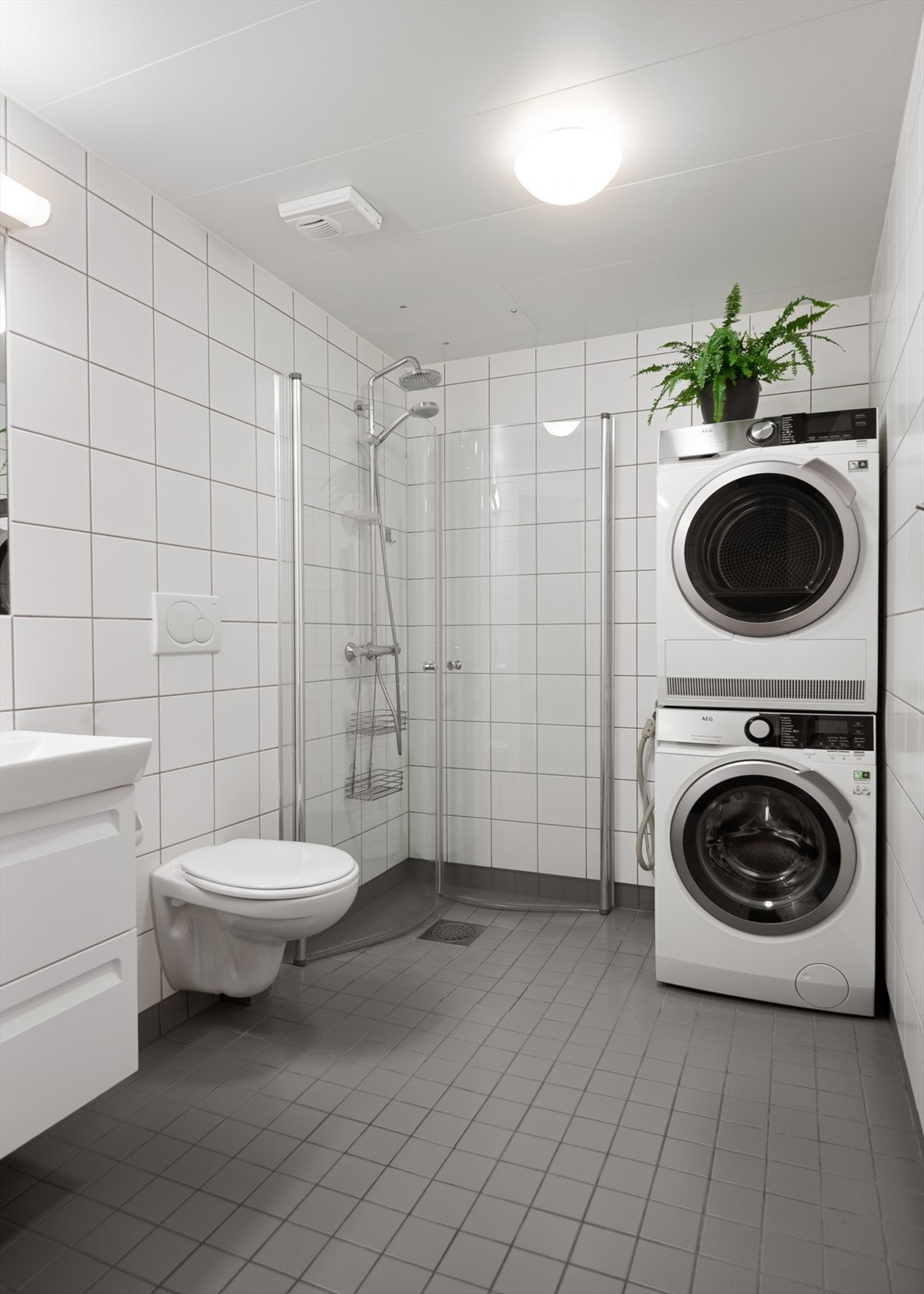 Flislagt bad med varmekabler i gulvet for økt komfort. Galleribilde