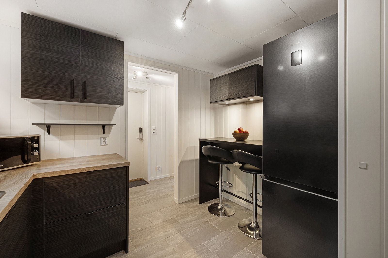 Det er tilkoblet en ventilator over kokeplassen. Galleribilde