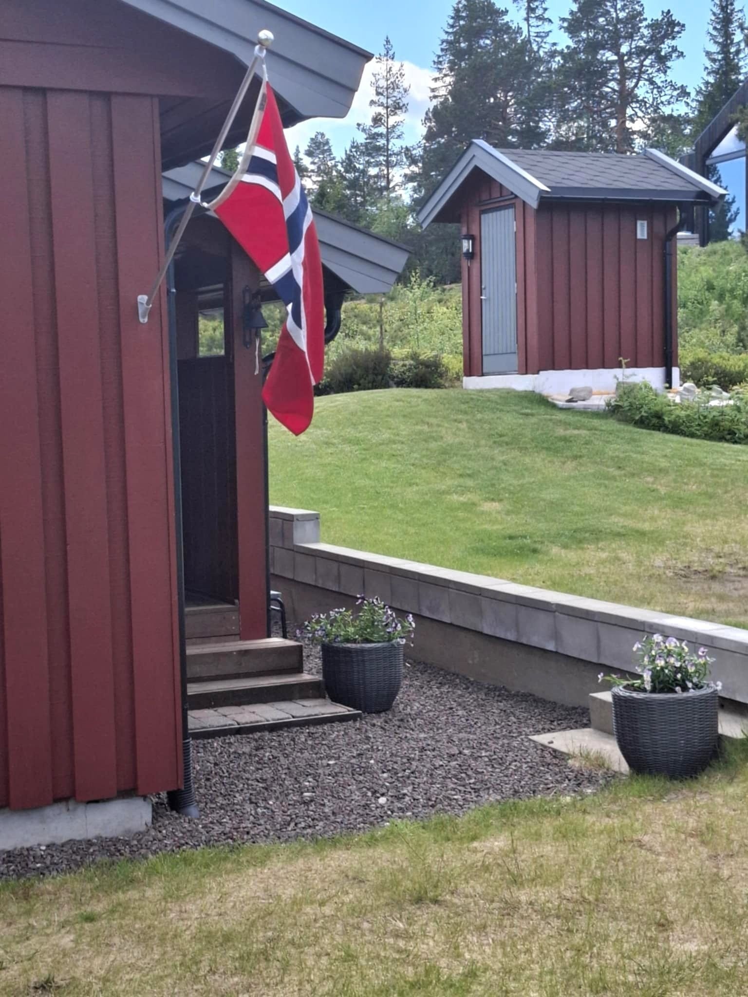 Brønnhuset i bakgrunn Galleribilde