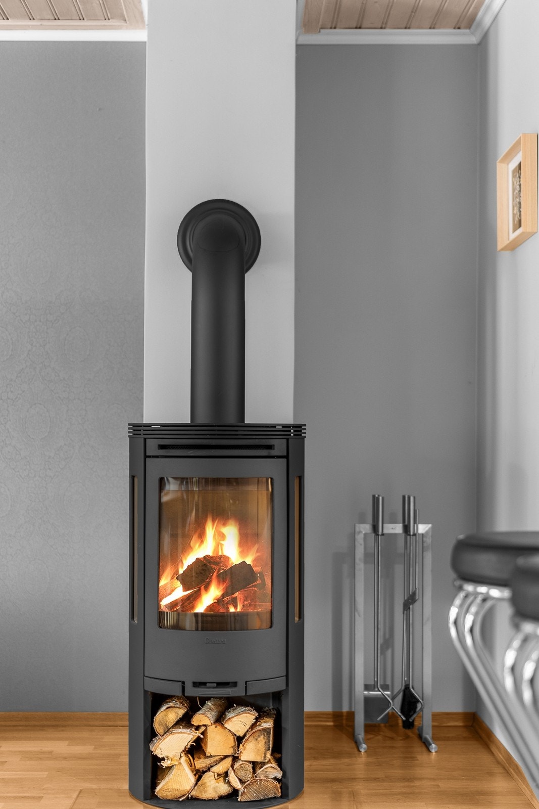 En moderne peisovn sørger for ekstra varme og hygge på kalde dager. Galleribilde