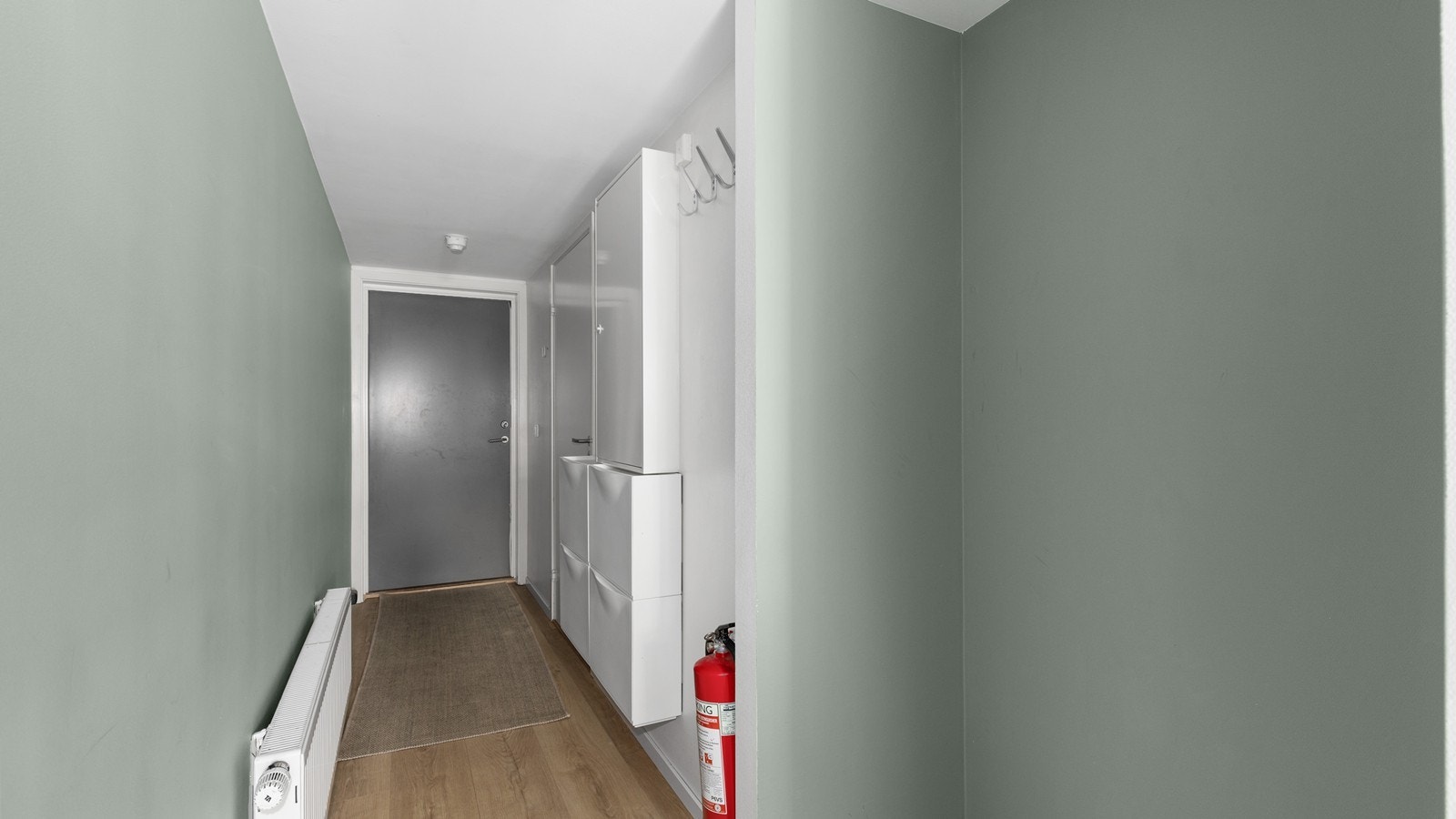 Leiligheten har fyring gjennom radiatorer Galleribilde