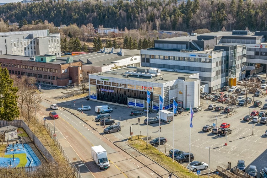 Rema 1000 ligger like nedenfor blokken Galleribilde