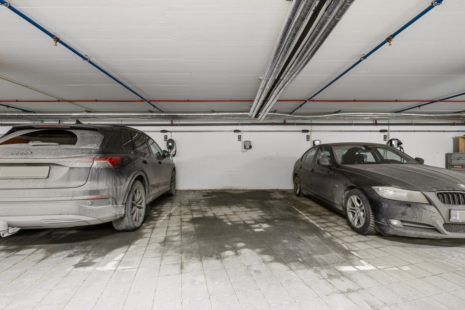 Det medfølger en parkeringsplass med elbillader i felles parkeringskjeller. Galleribilde