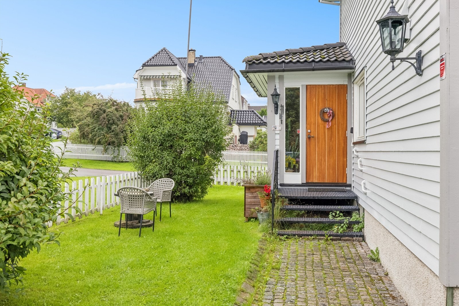 Inngangsparti fra Haralds gate - inngjerdet hjørnetomt Galleribilde