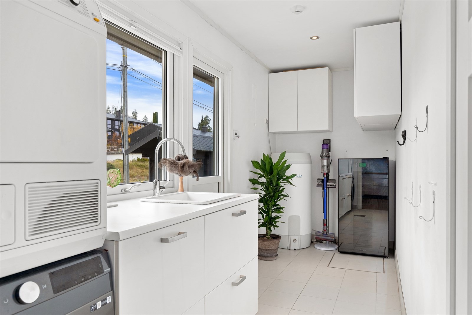 Praktisk vaskerom med egen inngangsdør Galleribilde