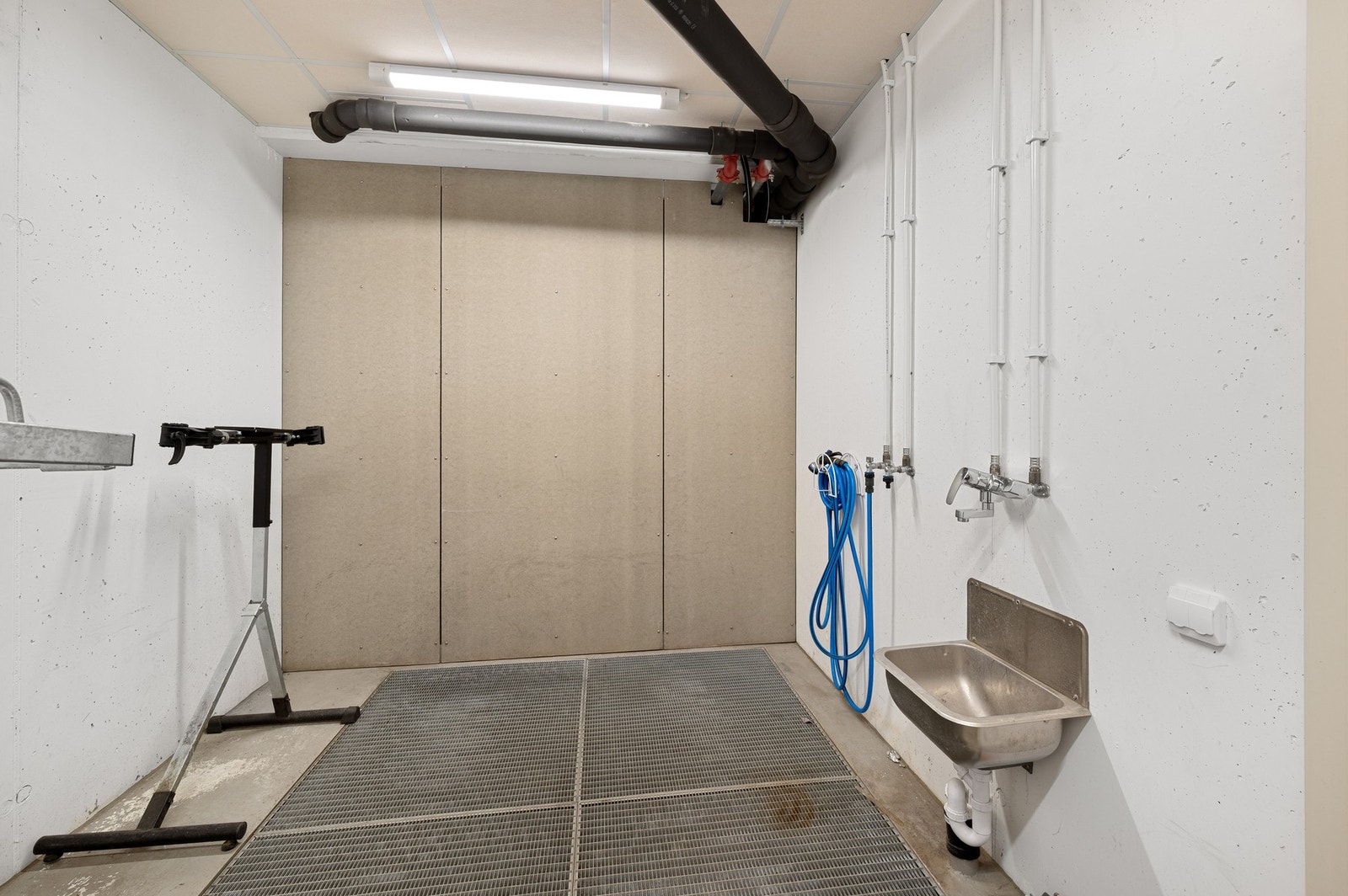 Felles rom for vasking og vedlikehold. Galleribilde