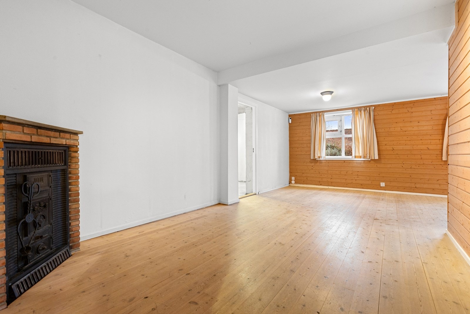 En ekstra stue gir familien større fleksibilitet og skaper et flott oppholdsrom for barna. Galleribilde