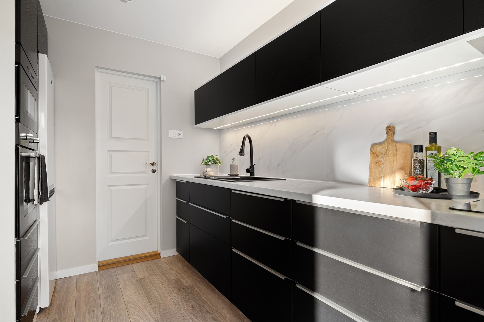 Vaskerommet ligger i tilknytning til kjøkkenet. Galleribilde