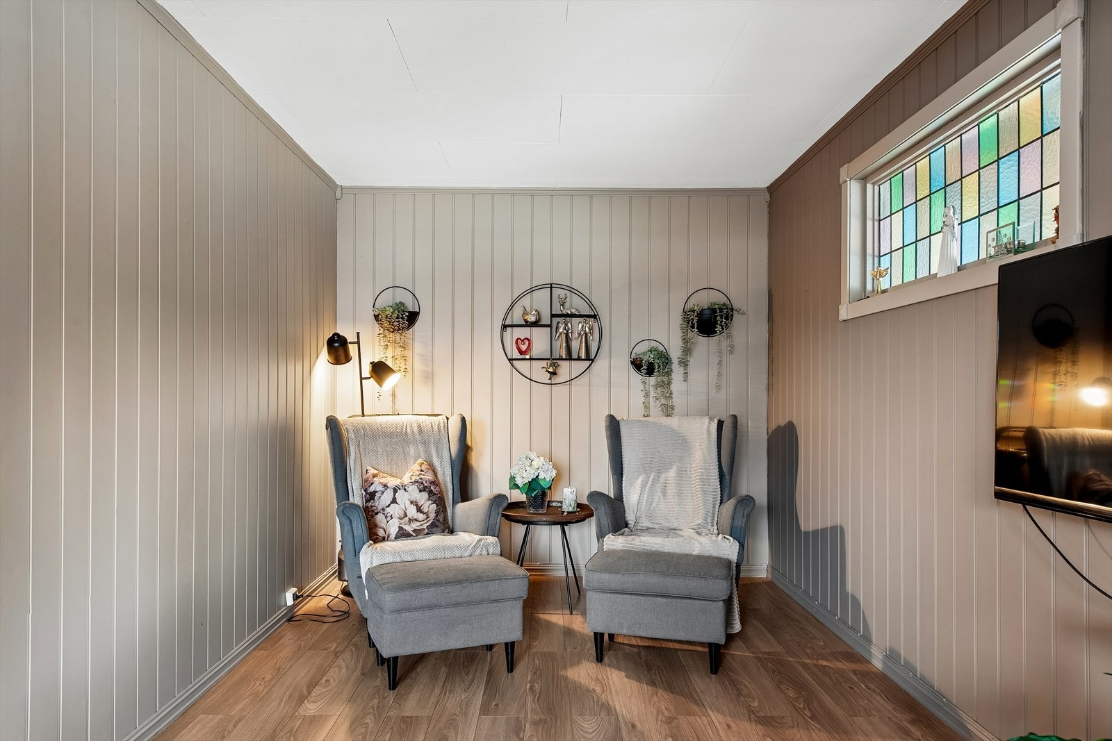 En egen krok gir rom for en mer tilbaketrukket TV-stue eller et lesehjørne. Galleribilde