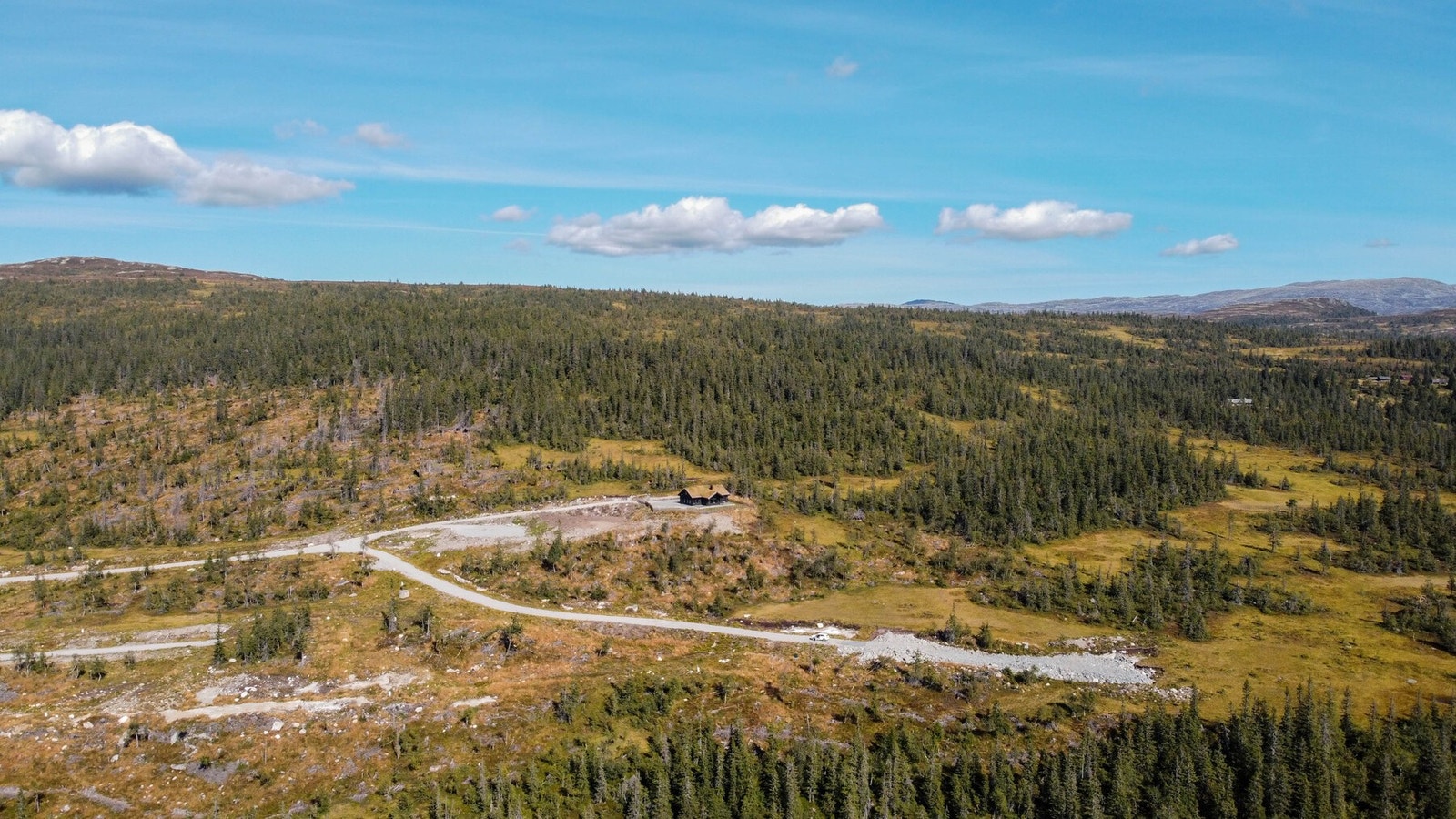 Foto over tomteområdet. Galleribilde