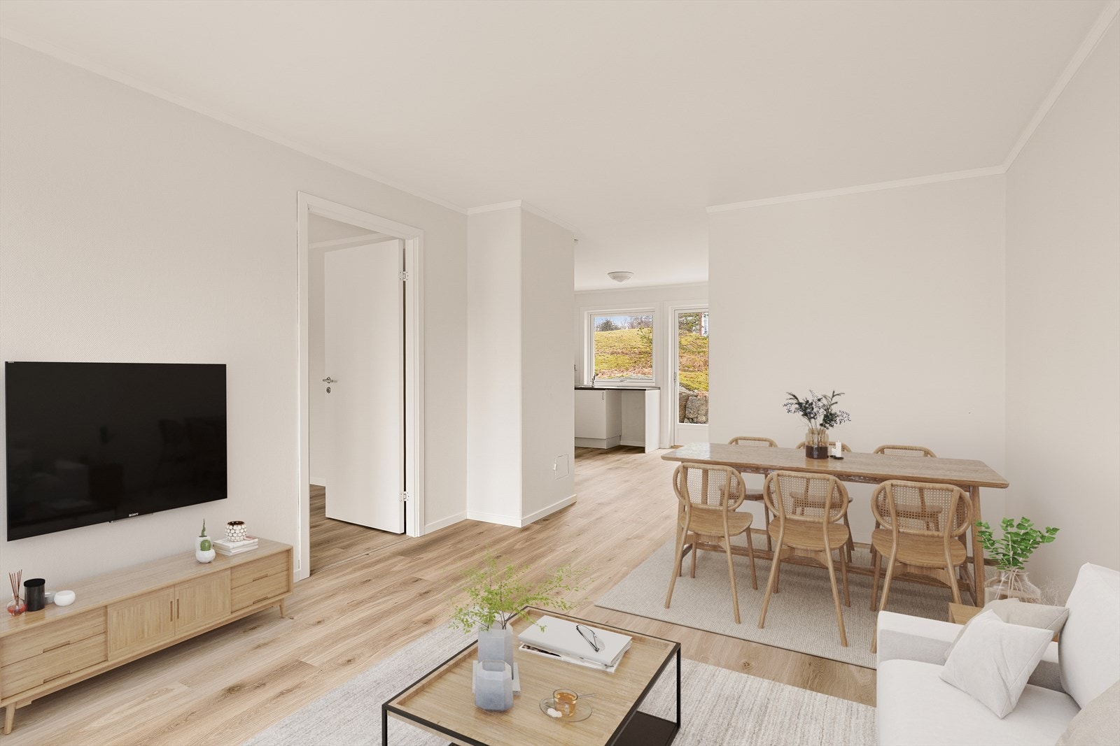 Her ser man enkelt for seg en hyggelig spiseplass i tilknytning til både stue og kjøkken. Galleribilde