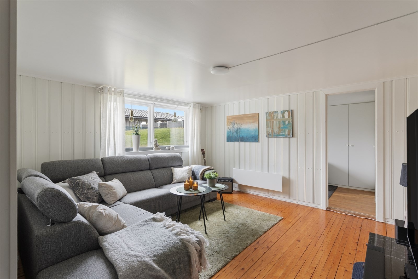 Hyggelig stue i sokkelleilighet Galleribilde