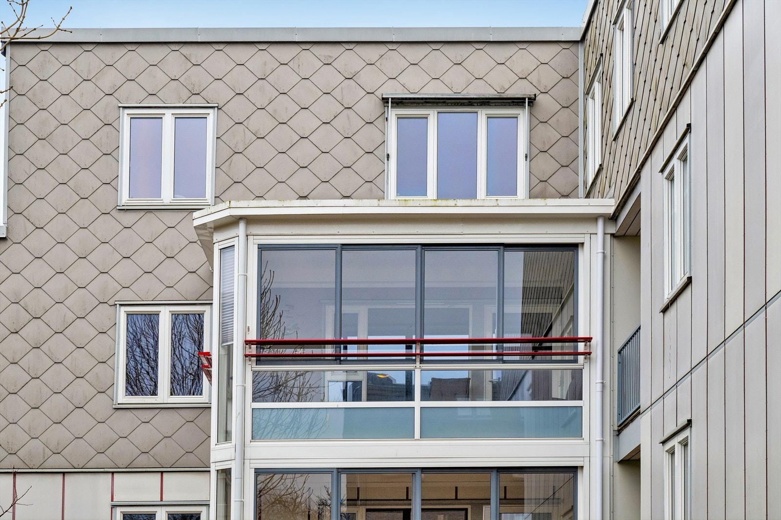 Den innglassede balkongen er et ekstra rom du får glede av hele året. Galleribilde