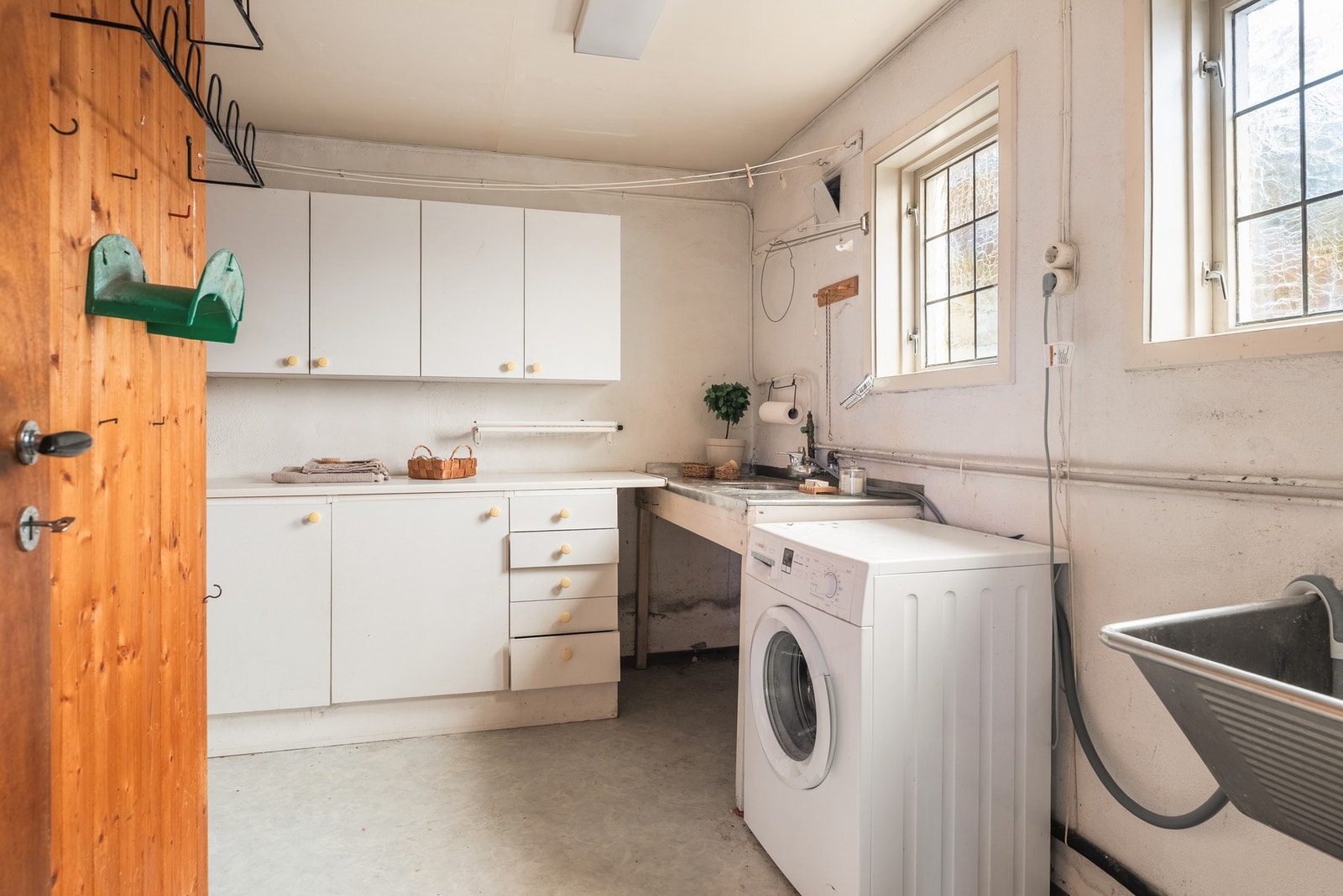 I underetasjen har du et eget vaskerom på 8,4 kvm med god plass til både vaskemaskin og tørketrommel. Galleribilde